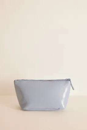 Small blue patent leather toiletry bag